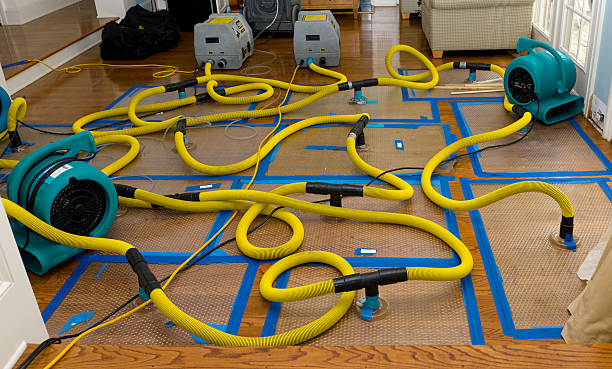 Professional Flood Damage Restoration technician working in Kilbourne, OH